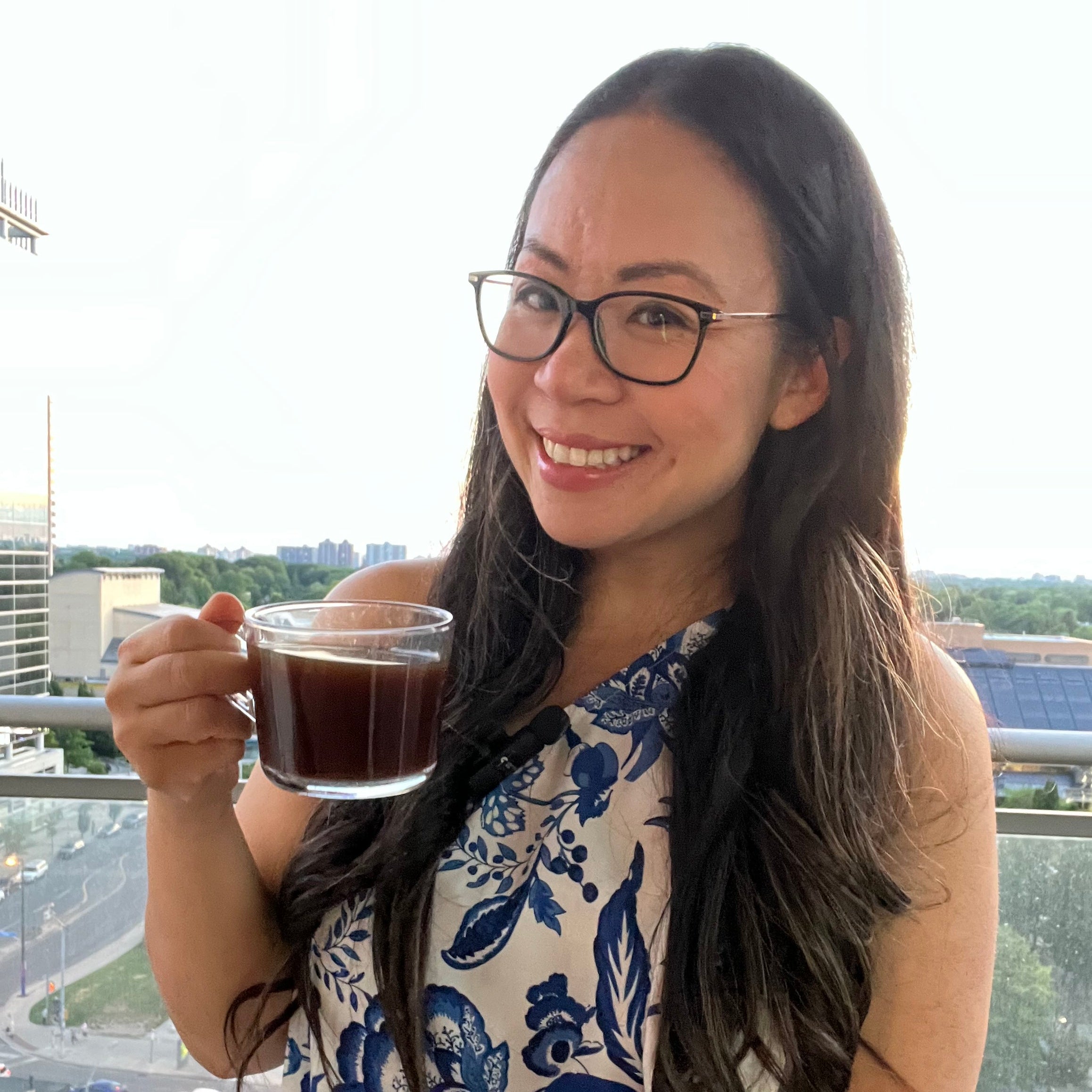 woman holding a cup of coffee